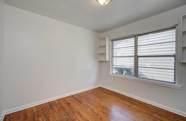 1708 S Park Dr, Alvin, TX 77511 - unfurnished room featuring wood-type flooring