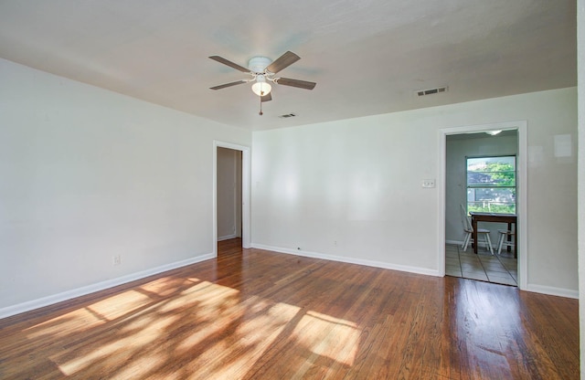 1708 S Park Dr, Alvin, TX 77511 - spare room featuring ceiling fan and wood finished floors