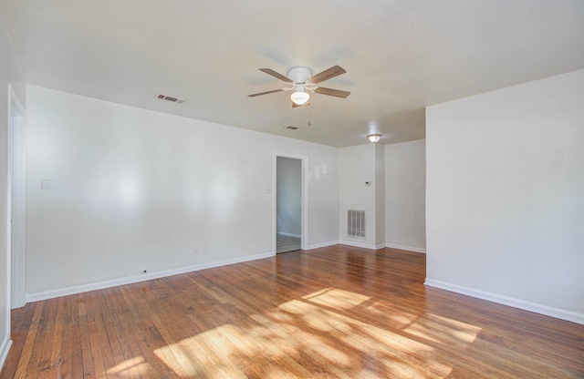 1708 S Park Dr, Alvin, TX 77511 - unfurnished room featuring a ceiling fan and wood finished floors