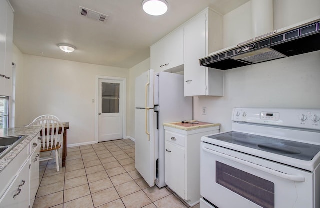 1708 S Park Dr, Alvin, TX 77511 - kitchen featuring white appliances, under cabinet range hood, white cabinets, and light countertops