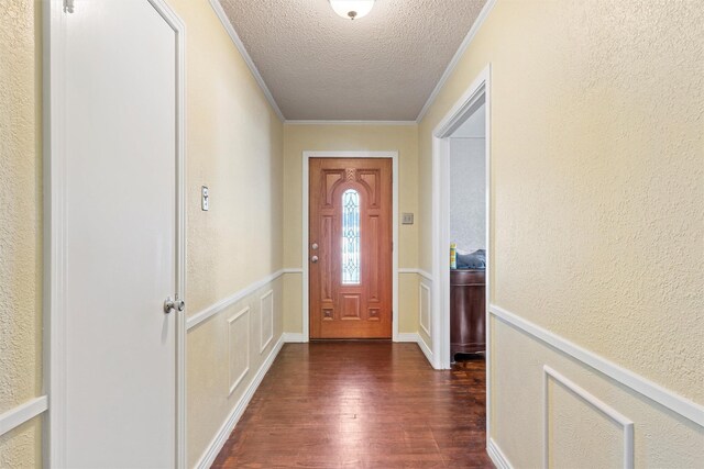 3310 Lake Heights Dr, Waco, TX 76708 - doorway to outside with a textured ceiling, dark wood finished floors, and crown molding