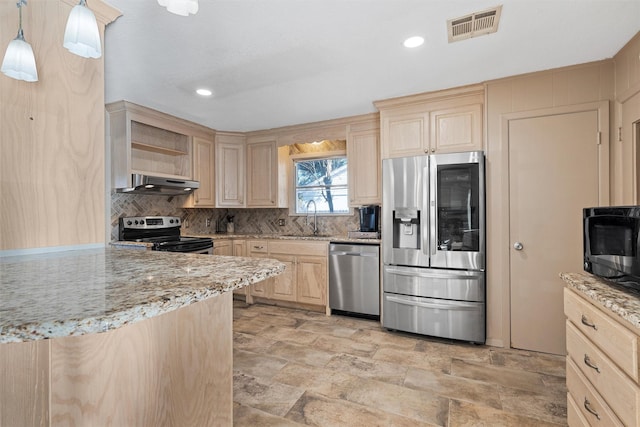 3310 Lake Heights Dr, Waco, TX 76708 - kitchen with appliances with stainless steel finishes, under cabinet range hood, light brown cabinets, open shelves, and backsplash
