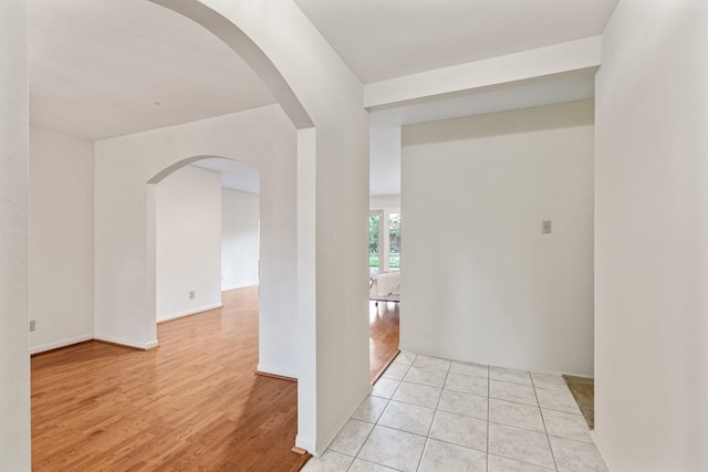9622 Highmeadow Dr, Houston, TX 77063 - hall featuring arched walkways and light wood-style floors