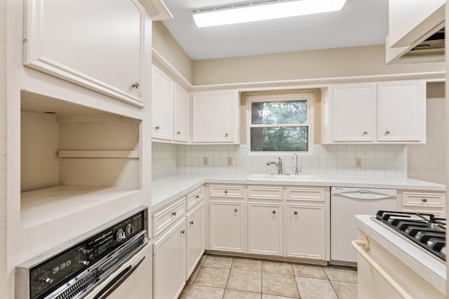9622 Highmeadow Dr, Houston, TX 77063 - kitchen with oven, dishwasher, backsplash, and white cabinetry