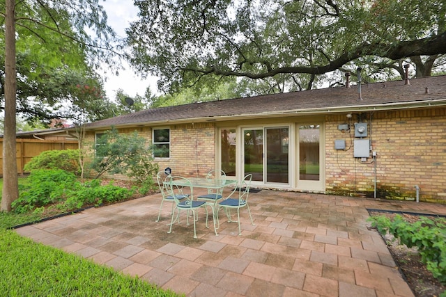 9622 Highmeadow Dr, Houston, TX 77063 - back of house with brick siding and a patio