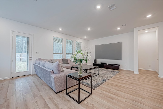 23722 Canolo Grove Ln, New Caney, TX 77357 - living room featuring light wood finished floors, healthy amount of natural light, and recessed lighting