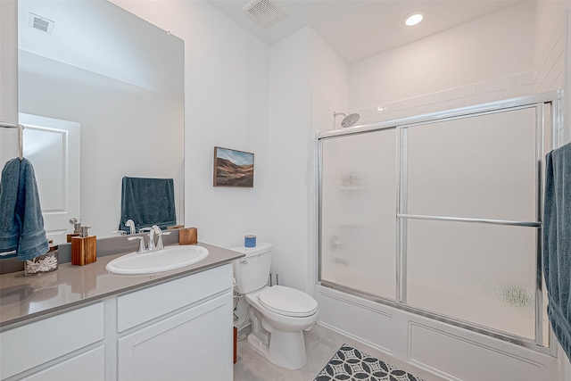 23722 Canolo Grove Ln, New Caney, TX 77357 - full bathroom with bath / shower combo with glass door, vanity, and tile patterned floors