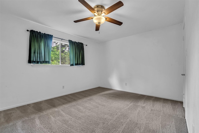 8115 Winding Oak Ln, Spring, TX 77379 - empty room featuring a ceiling fan and carpet