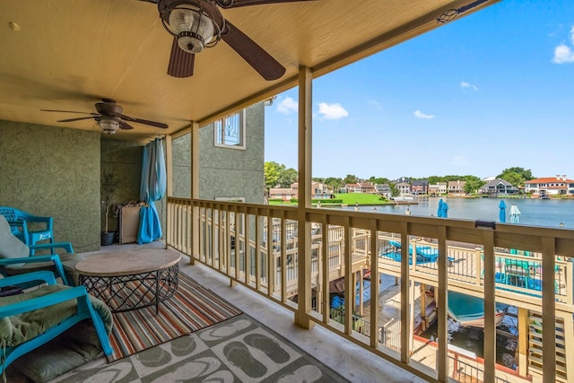 145 Capetown, Montgomery, TX 77356 - balcony with ceiling fan, a water view, and a residential view
