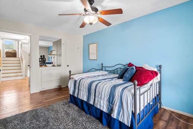 145 Capetown, Montgomery, TX 77356 - bedroom with wood finished floors and ceiling fan