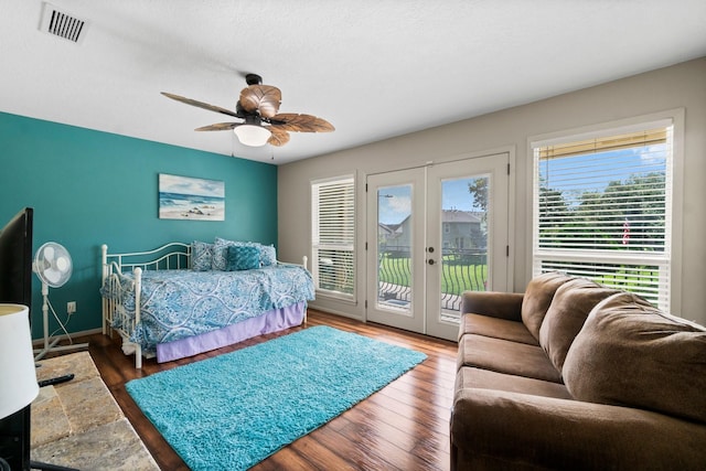 145 Capetown, Montgomery, TX 77356 - bedroom with french doors, access to exterior, wood finished floors, and ceiling fan