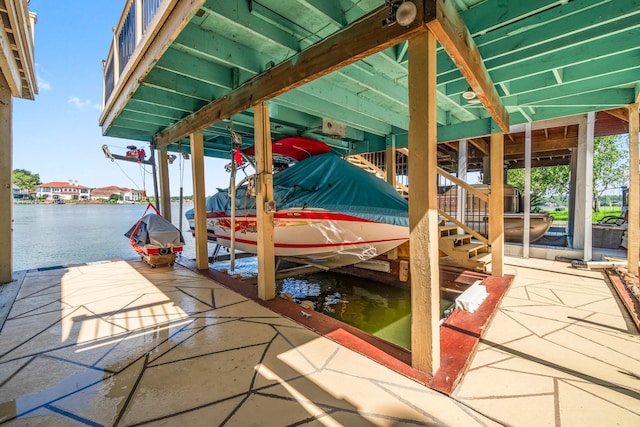145 Capetown, Montgomery, TX 77356 - dock area featuring boat lift and a water view