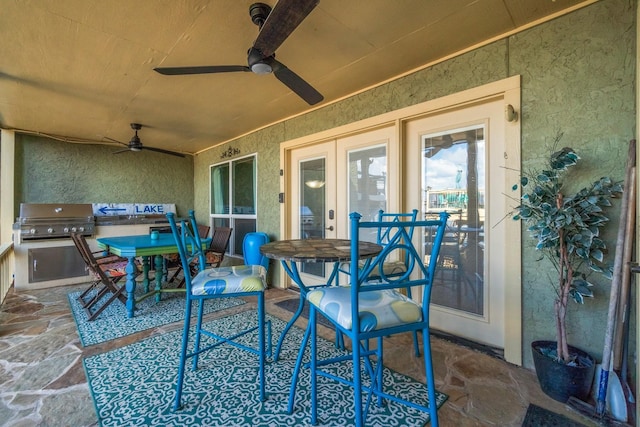 145 Capetown, Montgomery, TX 77356 - view of patio with a ceiling fan, outdoor dining space, and an outdoor kitchen