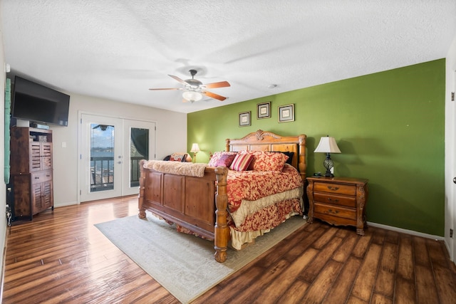 145 Capetown, Montgomery, TX 77356 - bedroom with access to outside, wood finished floors, french doors, a textured ceiling, and a ceiling fan