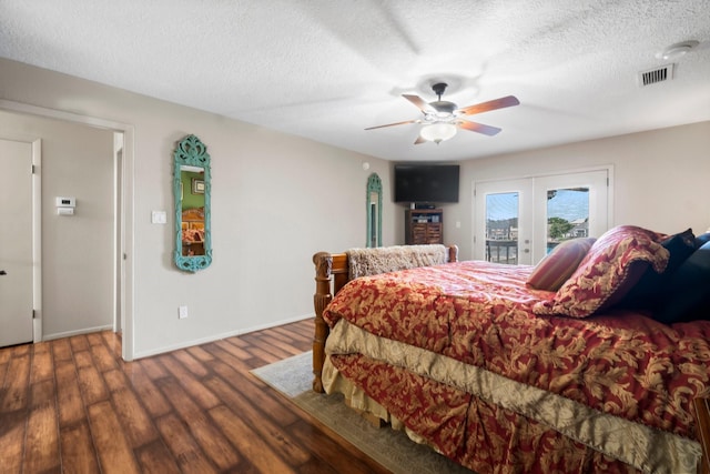 145 Capetown, Montgomery, TX 77356 - bedroom featuring access to exterior, a textured ceiling, wood finished floors, and a ceiling fan