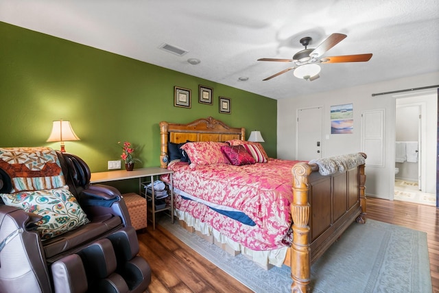 145 Capetown, Montgomery, TX 77356 - bedroom featuring wood finished floors and a ceiling fan