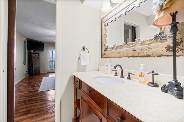 145 Capetown, Montgomery, TX 77356 - bathroom with wood finished floors and vanity