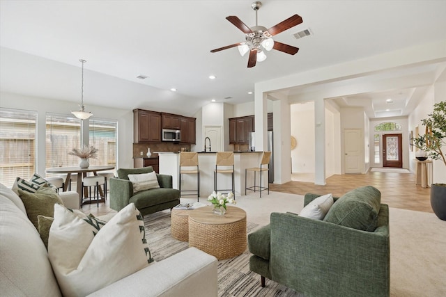 3112 Rock Brook Falls Ln, League City, TX 77573 - living room with ceiling fan, recessed lighting, and lofted ceiling