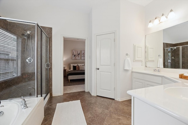 3112 Rock Brook Falls Ln, League City, TX 77573 - ensuite bathroom with a shower stall, vanity, a garden tub, and tile patterned floors