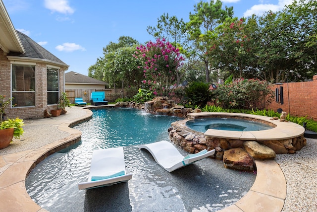 4402 Eden Point Ln, Katy, TX 77494 - view of swimming pool with a fenced backyard, a pool with connected hot tub, and a patio area