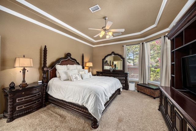 4402 Eden Point Ln, Katy, TX 77494 - bedroom with a tray ceiling, light colored carpet, ornamental molding, and a ceiling fan