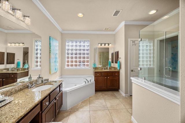 4402 Eden Point Ln, Katy, TX 77494 - full bath with a stall shower, two vanities, a jetted tub, tile patterned floors, and crown molding