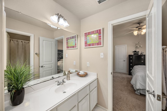 4402 Eden Point Ln, Katy, TX 77494 - ensuite bathroom featuring vanity and a ceiling fan