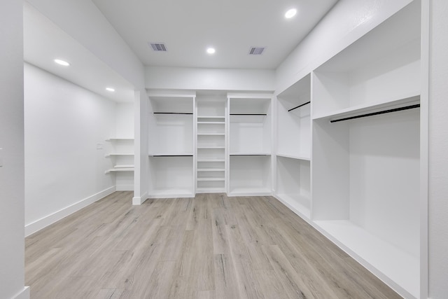 25050 Shady Oak Dr, Hockley, TX 77447 - walk in closet featuring light wood-type flooring