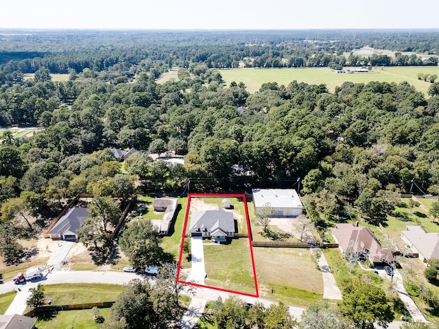 25050 Shady Oak Dr, Hockley, TX 77447 - aerial perspective of suburban area featuring property boundaries highlighted and a heavily wooded area