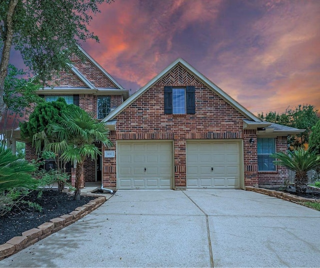 4142 Regal Stone Ln, Sugar Land, TX 77479 - traditional-style house with brick siding and driveway