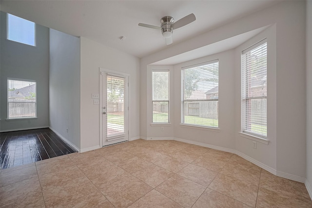 4142 Regal Stone Ln, Sugar Land, TX 77479 - tiled spare room with a ceiling fan and plenty of natural light