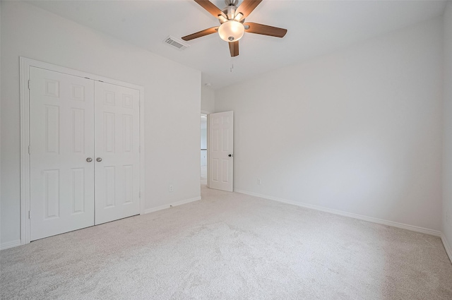 4142 Regal Stone Ln, Sugar Land, TX 77479 - unfurnished bedroom featuring light carpet, a closet, and ceiling fan