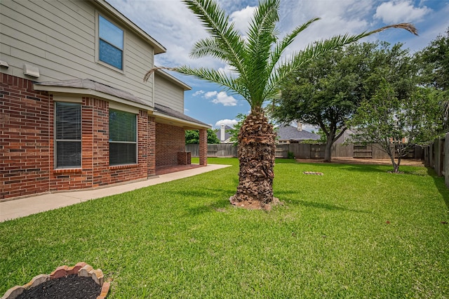 4142 Regal Stone Ln, Sugar Land, TX 77479 - fenced backyard with a patio area