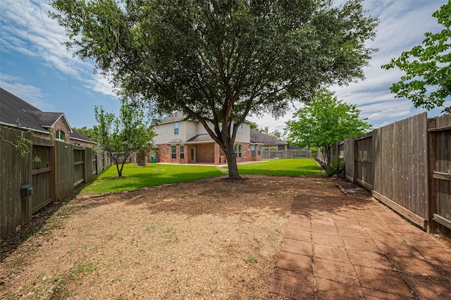 4142 Regal Stone Ln, Sugar Land, TX 77479 - fenced backyard featuring a patio area