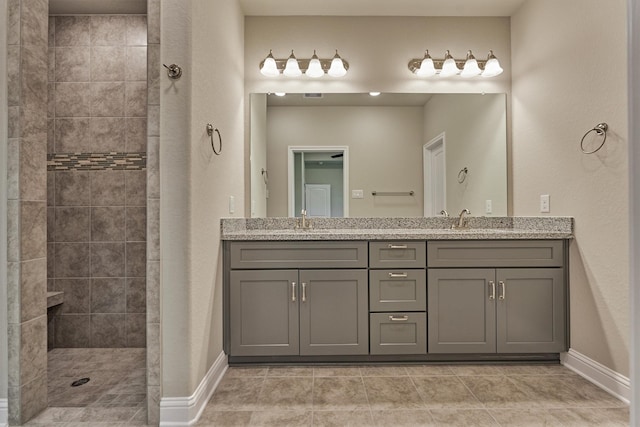 10477 Valley Dr N, Willis, TX 77318 - full bath with double vanity, a walk in shower, and tile patterned floors