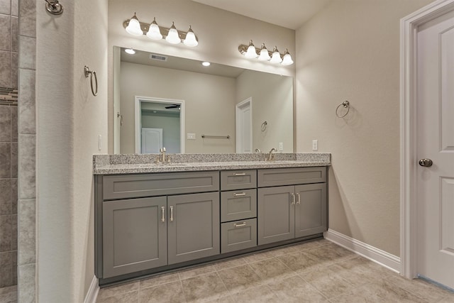 10477 Valley Dr N, Willis, TX 77318 - full bath featuring double vanity, tile patterned flooring, and a tile shower