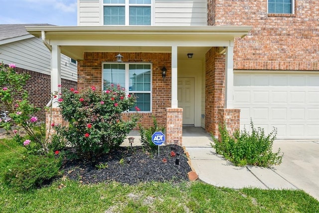 3514 Marquesa Ln, Houston, TX 77084 - view of exterior entry with brick siding and a porch