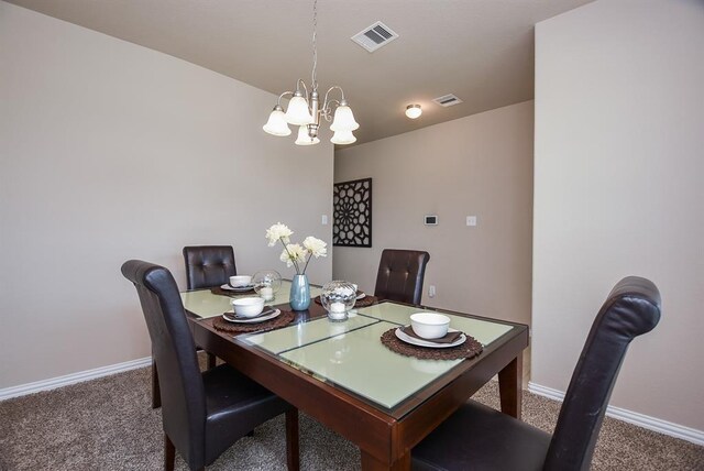 3514 Marquesa Ln, Houston, TX 77084 - dining space featuring a chandelier and carpet floors