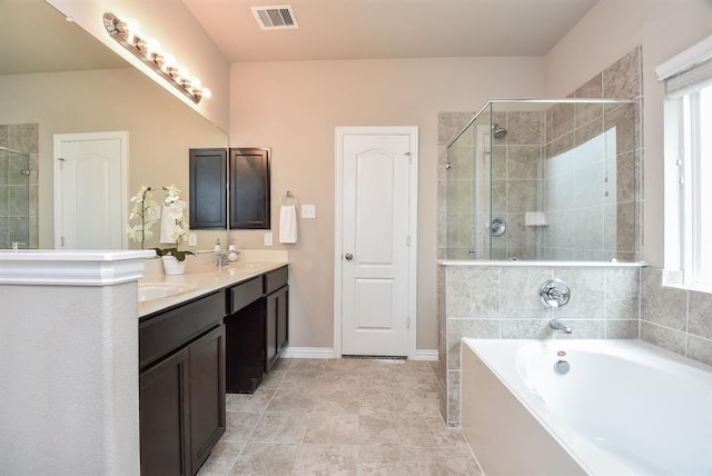 3514 Marquesa Ln, Houston, TX 77084 - bathroom with double vanity, a garden tub, and a shower stall