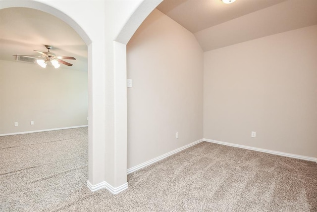 3514 Marquesa Ln, Houston, TX 77084 - carpeted empty room with a ceiling fan, lofted ceiling, and arched walkways