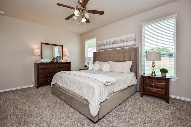3514 Marquesa Ln, Houston, TX 77084 - carpeted bedroom with baseboards and ceiling fan