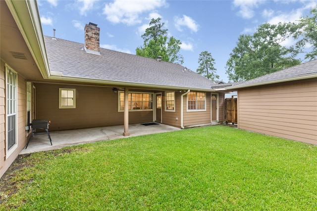 2006 Echo Ridge Ct, Houston, TX 77339 - rear view of house with a patio, a chimney, and roof with shingles