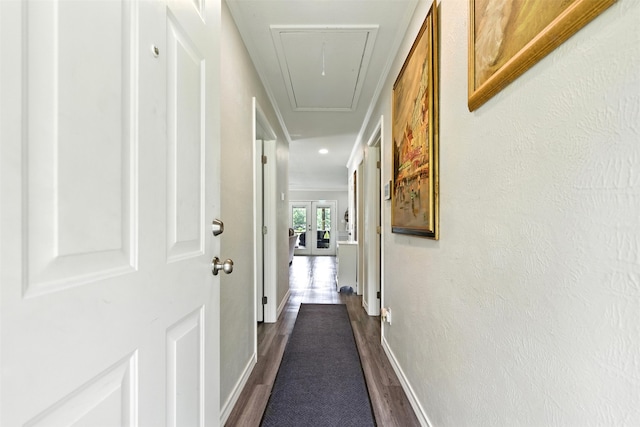 530 W Sherwood Forest Dr W, Woodville, TX 75979 - corridor with attic access and dark wood-style floors