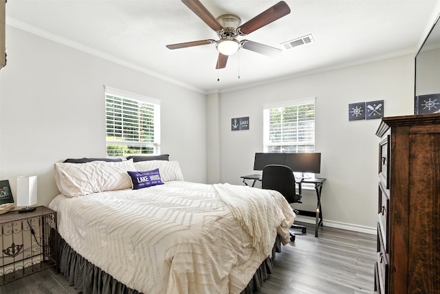 530 W Sherwood Forest Dr W, Woodville, TX 75979 - bedroom with wood finished floors, crown molding, a ceiling fan, and an office area