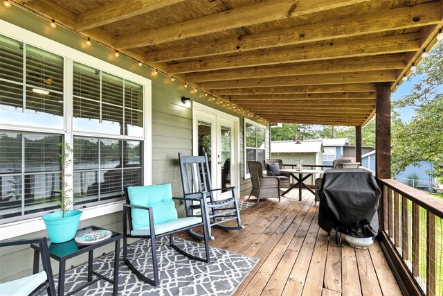 530 W Sherwood Forest Dr W, Woodville, TX 75979 - deck with french doors and grilling area