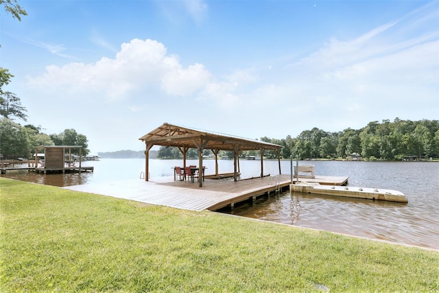 530 W Sherwood Forest Dr W, Woodville, TX 75979 - dock with a water view and a lawn