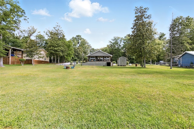530 W Sherwood Forest Dr W, Woodville, TX 75979 - view of green lawn with a storage unit