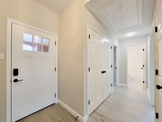 18106 Water Mill Dr, Cypress, TX 77429 - foyer entrance featuring light wood-style floors and baseboards