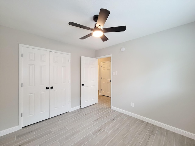 18106 Water Mill Dr, Cypress, TX 77429 - unfurnished bedroom with light wood-style flooring, a closet, and a ceiling fan
