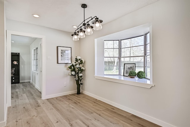 1201 Shady Oak Ln, Dickinson, TX 77539 - dining space with wood finished floors, recessed lighting, and a chandelier